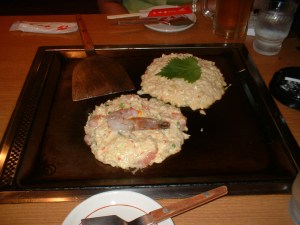 Halfmade shrimp and cheese Okonomiyaki Photo courtesy of Wikimedia Commons